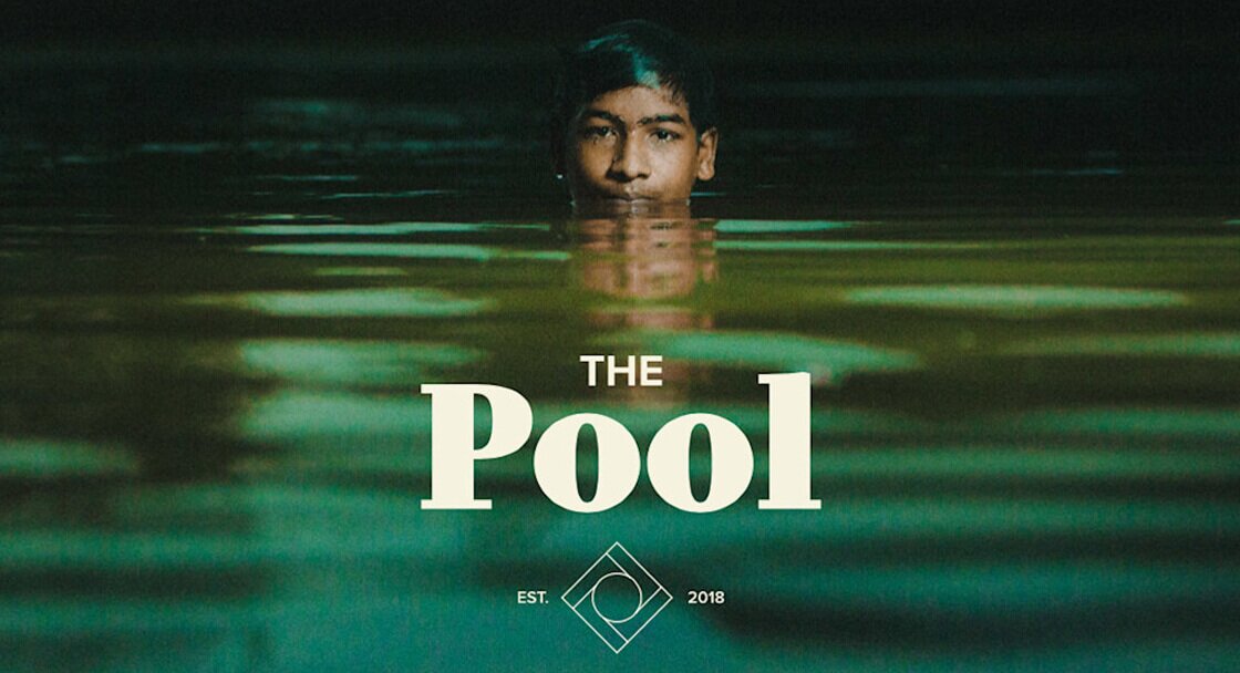 Boy swimming in a pool