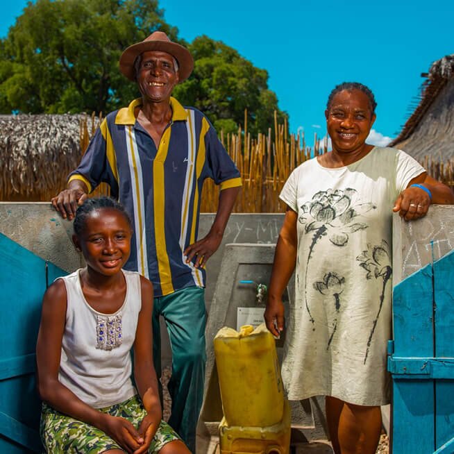 African family at a water tap