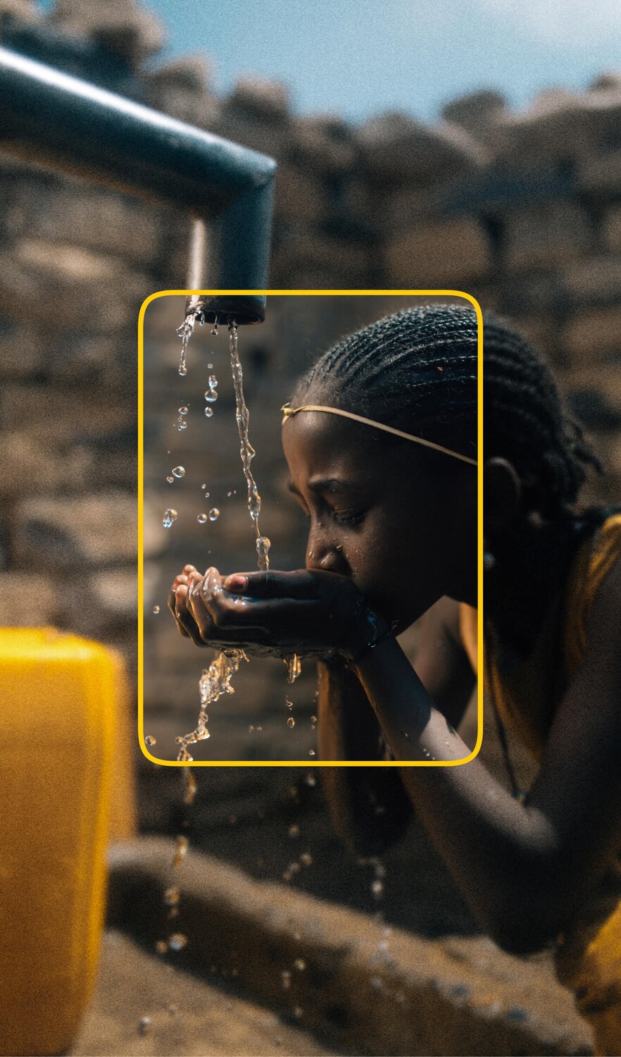 African girl filling her hands with clean, safe water and taking a drink