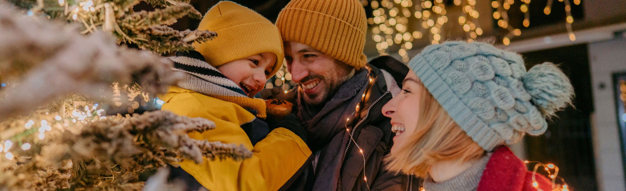 Family near christmas tree