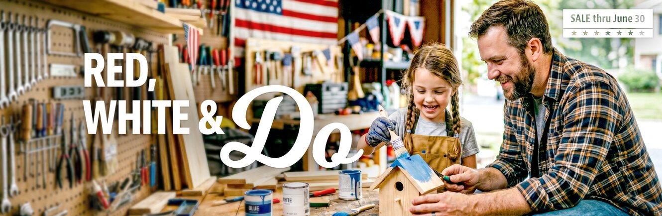 Dad and daughter painting a wood birdhouse in a garage. Red, white, and do, June sale.