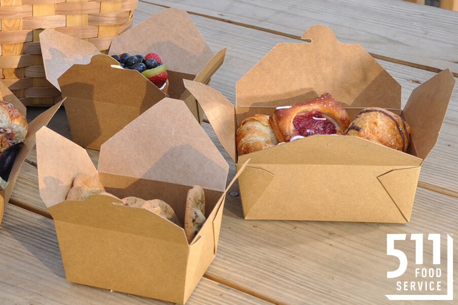 Green to go container with salad and clear top