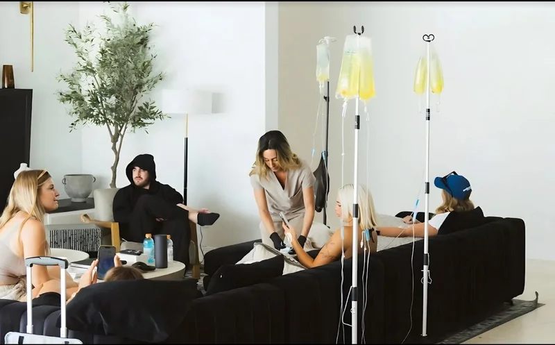 Professional IV Therapy Service - Stay Dripped clients receiving IV therapy in a luxury setting