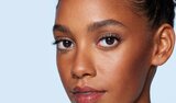 Model Before And After Applying Green Color Corrector Makeup