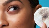Model Applying Skin Tint