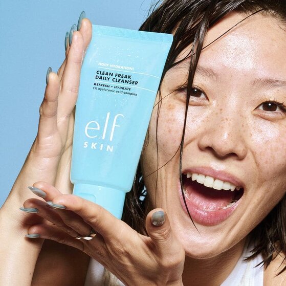 Model using e.l.f. SKIN face cleanser