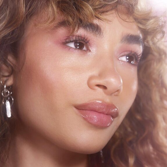 Woman with glowing makeup look