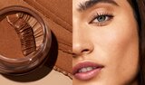Model Applying Skin Tint
