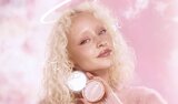 Model Applying Skin Tint