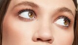Model Applying Skin Tint