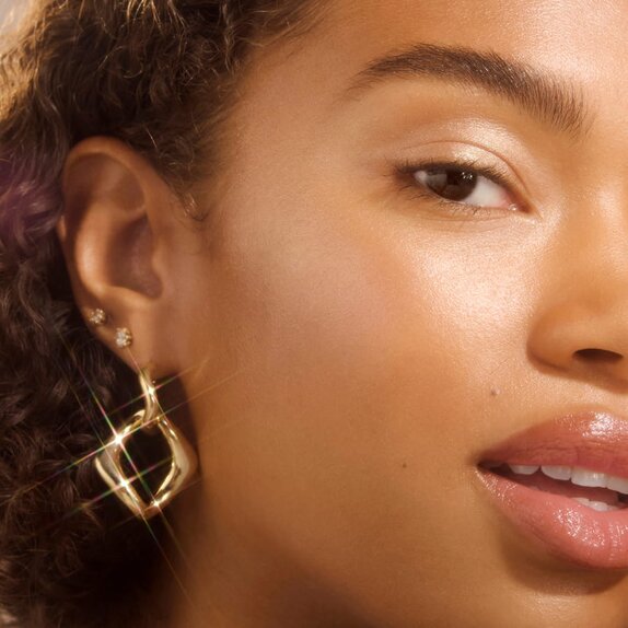 Woman with glowing sun-kissed makeup look