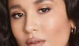 Model Before And After Applying Green Color Corrector Makeup