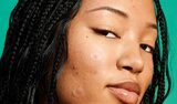 Model Applying Skin Tint
