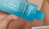 Model Applying Skin Tint