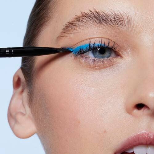 Model Applying Eyeliner