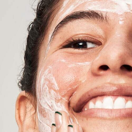 Model using Blemish Breakthrough Acne Clarifying Cleanser