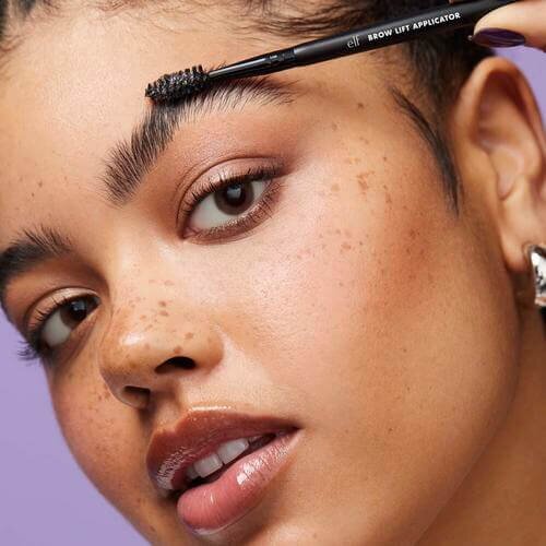Woman applying Brow Laminating Gel
