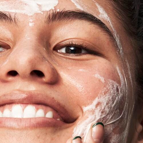 Model Applying e.l.f Cleanser