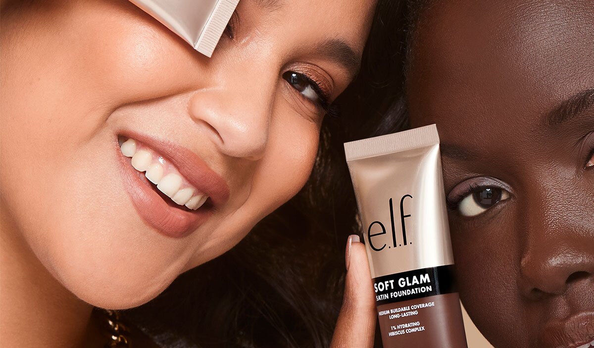 Models holding soft glam satin liquid foundation