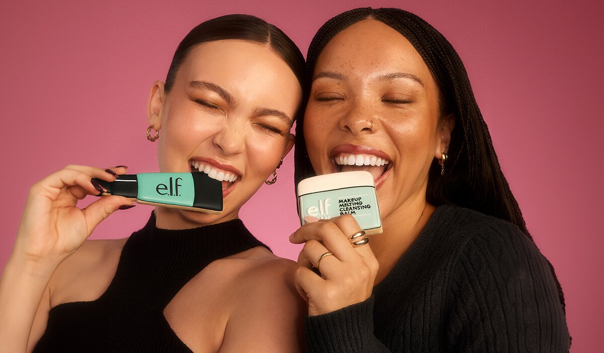 Models holding power grip primer and cleansing balm