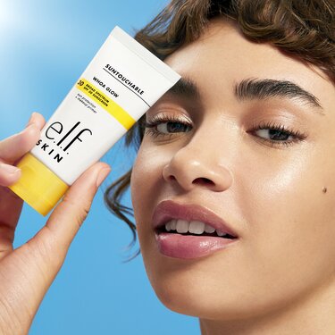 Model Using Suntouchable Whoa Glow with SPF 30