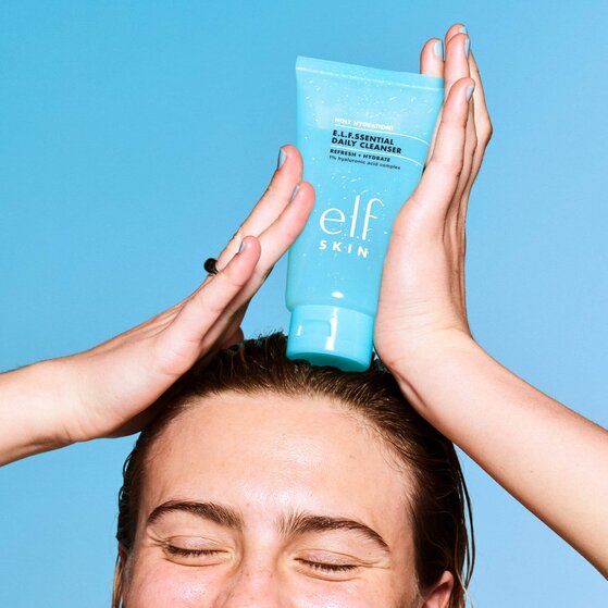 Model Holding Holy Hydration! Daily Cleanser

