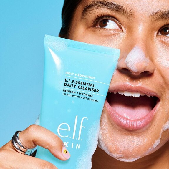 Model Using Hydrating Facial Cleanser