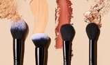 Model Applying Skin Tint
