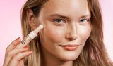 Model Before And After Applying Green Color Corrector Makeup