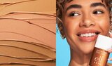 Model Applying Skin Tint