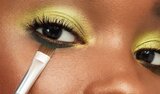 Model Applying Skin Tint