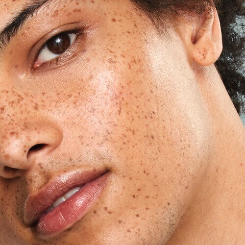 Model Applying Shimmer Eyeshadow Stick