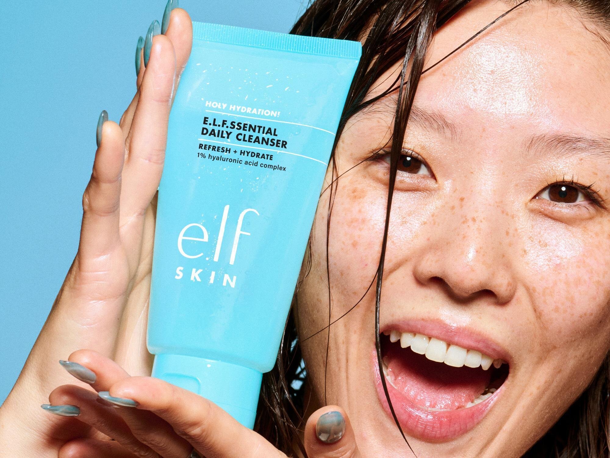 Model Holding Holy Hydration! e.l.f.ssential Daily Cleanser 