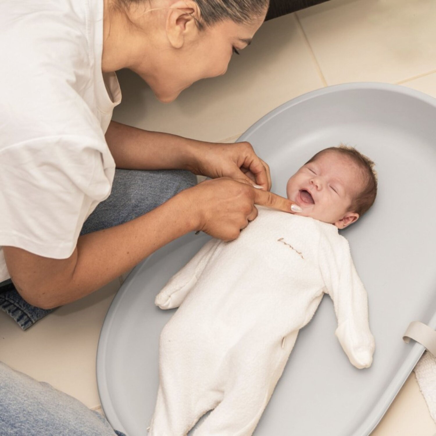 Baby on changing mat