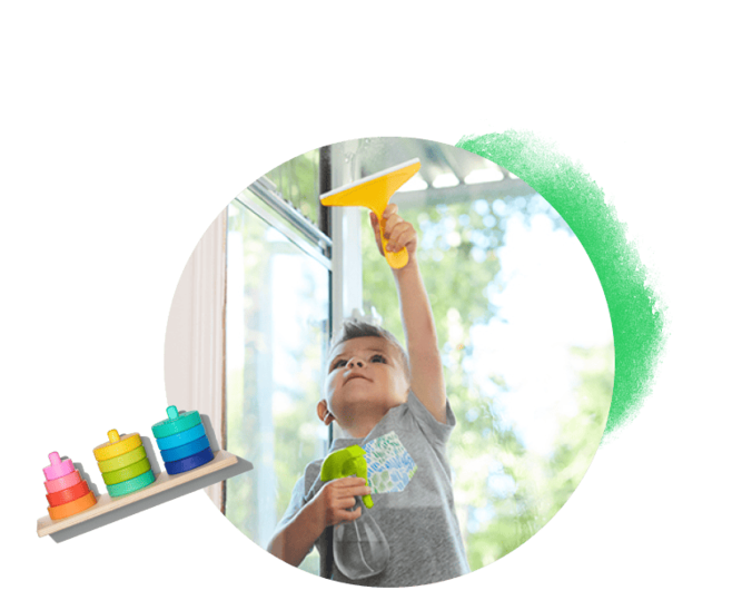Boy playing with the Squeaky Clean Squeegee Set