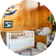 Nursery with Oeuf furniture, decor, and apparel
