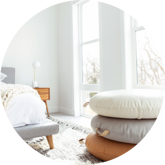 Bedroom with leather poufs