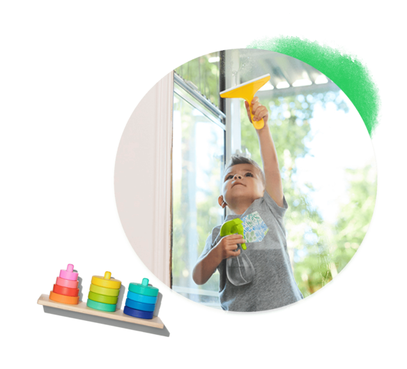Boy playing with the Squeaky Clean Squeegee Set