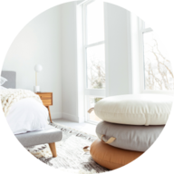 Bedroom with leather poufs