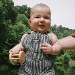 Baby wearing overalls