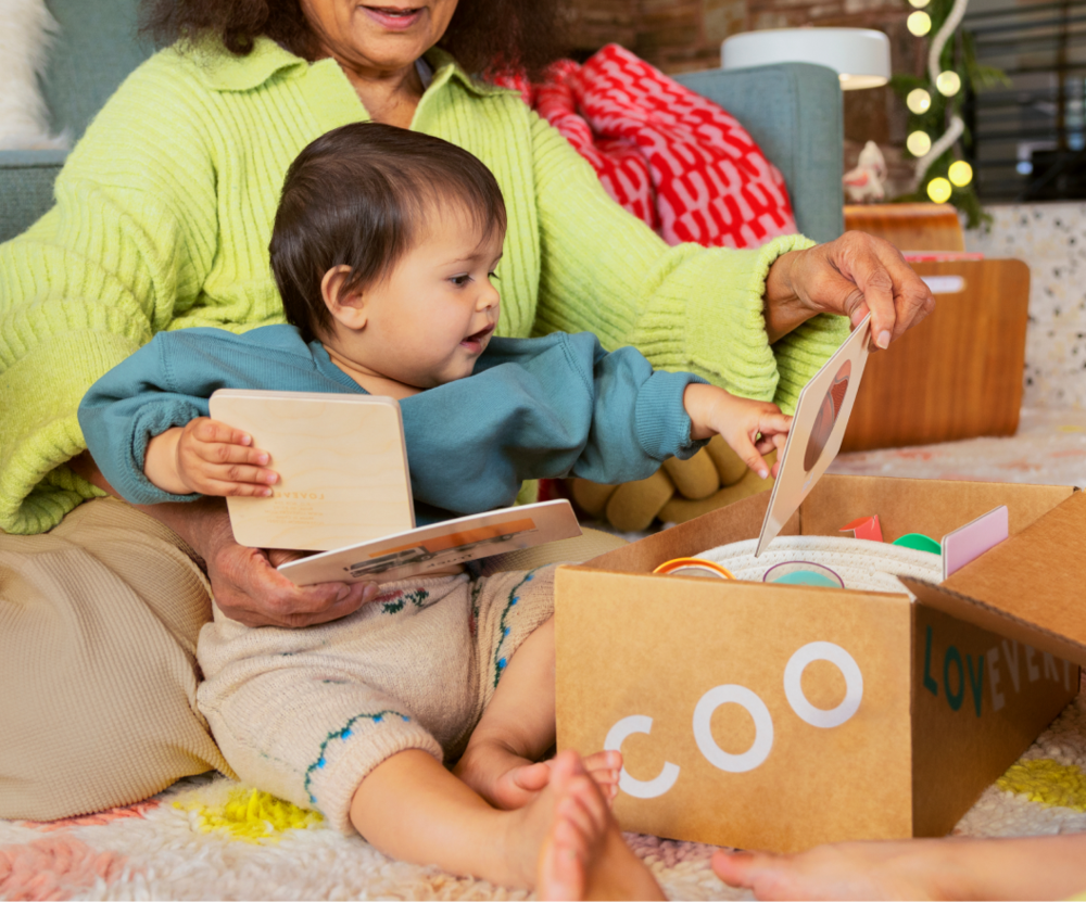 Mother and daughter opening a Lovevery Box