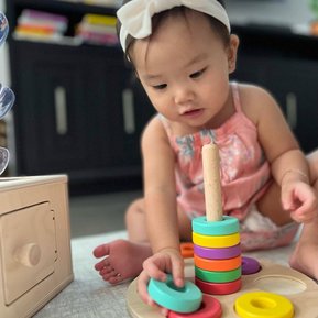 Child playing with a Lovevery toy