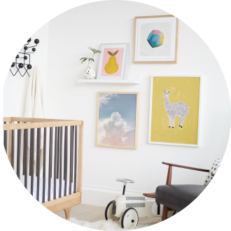 Baby nursery with colorful wall art