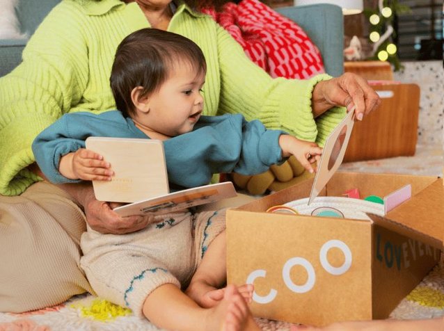 Mother and daughter opening a Lovevery Box