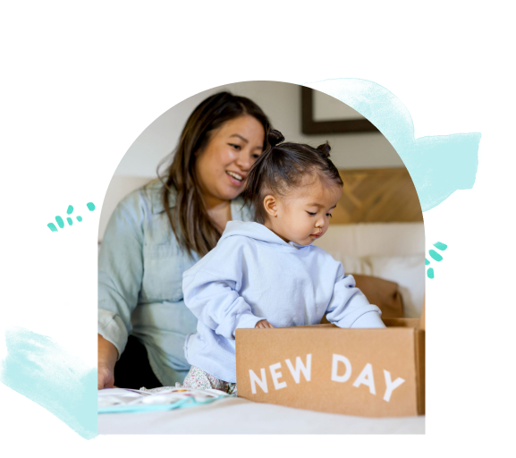 Mother and daughter opening a Lovevery box