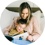 Mother and son reading Chatbooks photo book