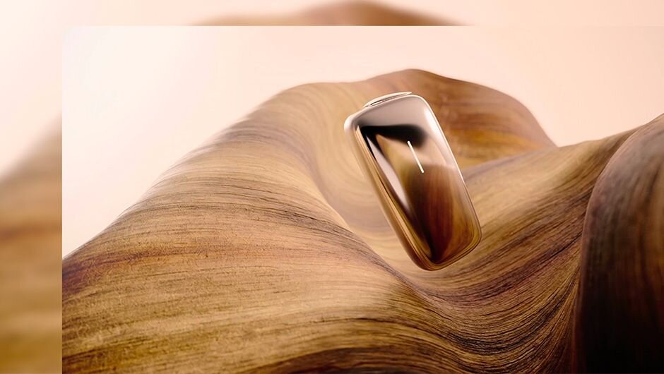 Zlaté zariadenie levituje nad vlnou pripomínajúcu piesok.