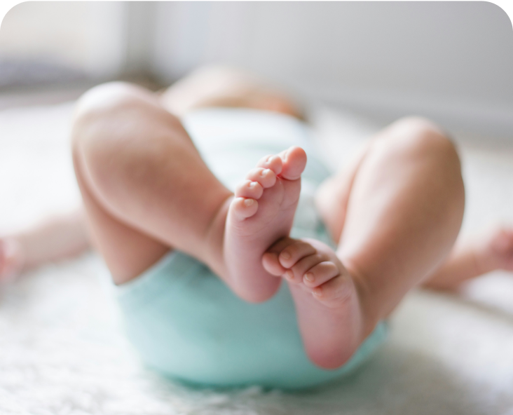 Baby laying on a changing table