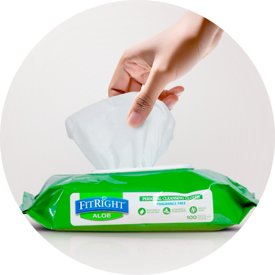 Image of a hand pulling out a FitRight adult wipe.