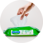 Image of a hand pulling out a FitRight adult wipe.